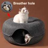 Soft donut-shaped cat bed by Smartlyo with cushioned interior for cozy feline comfort.