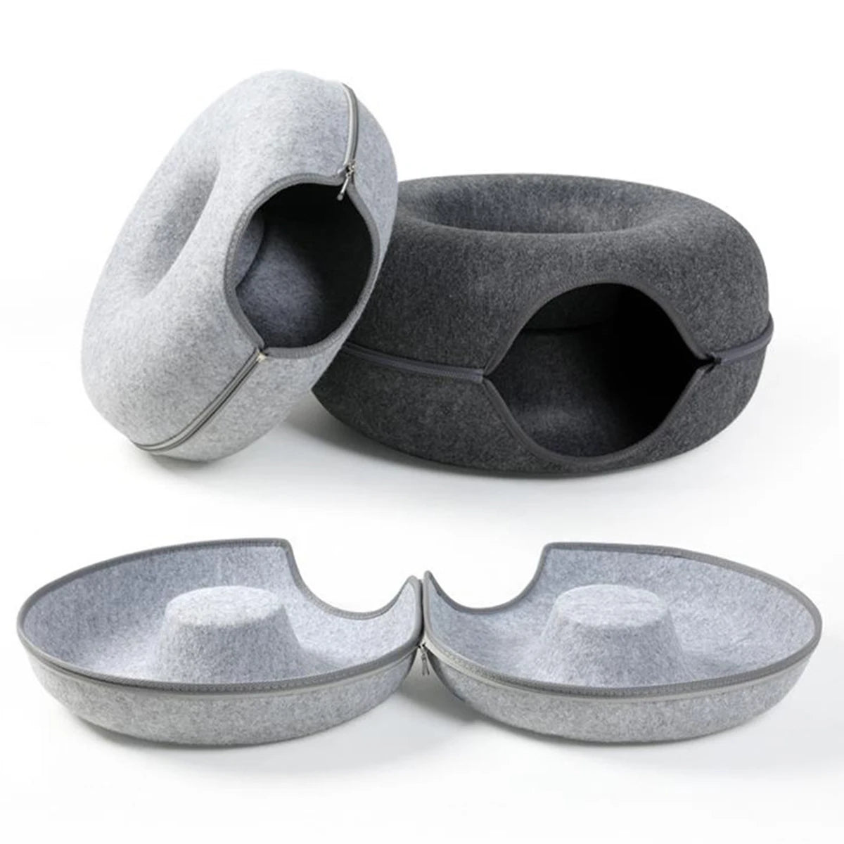 Soft donut-shaped cat bed by Smartlyo with plush fabric and cozy circular design for comfortable feline lounging.