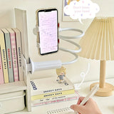 Smartlyo adjustable 360° rotating lazy phone holder with clamp attached to a desk for hands-free viewing.