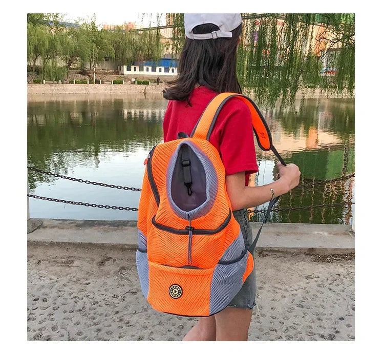 Smartlyo pet carrier portable travel backpack with mesh sides and adjustable straps for comfortable pet transport.