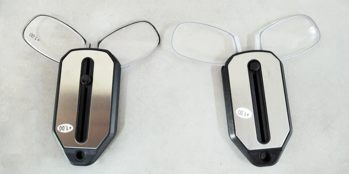 Folding pocket reading glasses with compact frame and clear lenses, designed for convenient reading on the go.