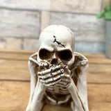 Realistic human skeleton decoration by Smartlyo for Halloween, showing a detailed plastic skeleton figure with bones and joints.
