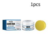 Smartlyo white shoe cleaning cream in a jar, with a brush applicator and clean white shoes in the background.