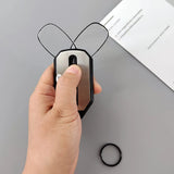 Compact folding pocket reading glasses with black frames, designed for easy carrying and convenient reading aid.