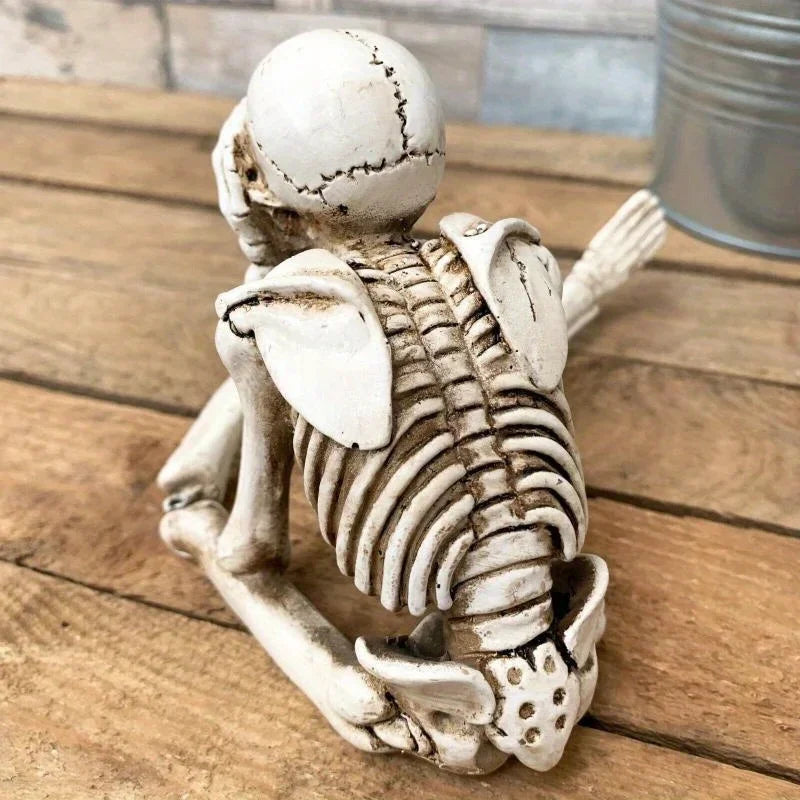 Human skeleton simulation Halloween decoration by Smartlyo, showing a detailed plastic skeleton figure for spooky seasonal decor.