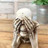Realistic human skeleton sculpture for Halloween decoration by Smartlyo, showing detailed bones and spooky pose.