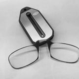 Folding pocket reading glasses with black frames, compact design, and spring hinges, ideal for portable reading convenience.