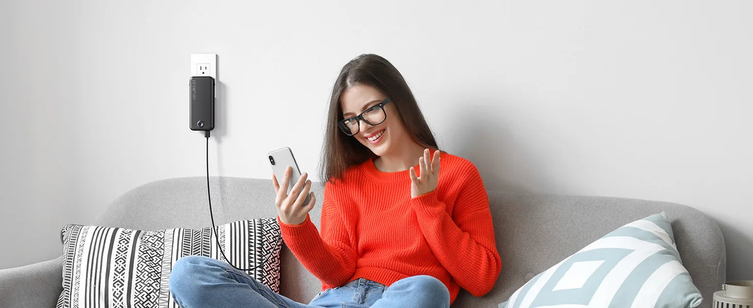 Smartlyo portable charger with built-in cables, compact design, and multiple charging ports for convenient mobile device power.