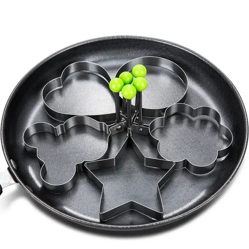 Stainless steel heart-shaped fried egg mold and pancake maker by Smartlyo, ideal for breakfast, omelettes, and baking in the kitchen.