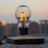 Magnetic levitation lamp by Smartlyo floating above a sleek base with a modern design and glowing light effect.
