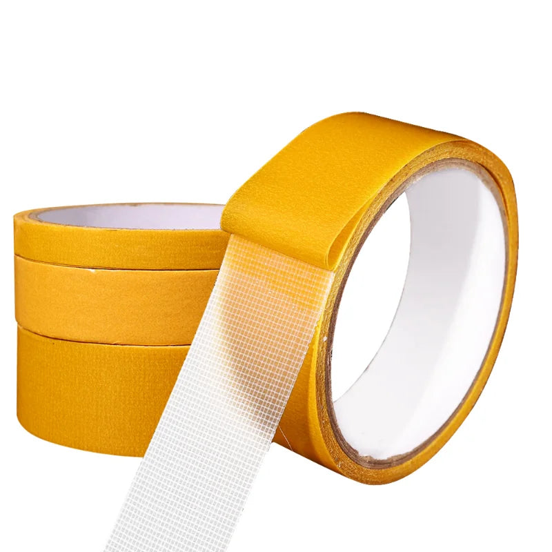 Double sided tape by Smartlyo, high viscosity grid fiber tape shown with clear application surface and textured grid design.