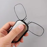 Folding pocket reading glasses with black frames, compact design, and adjustable temples for easy portability and comfortable wear.