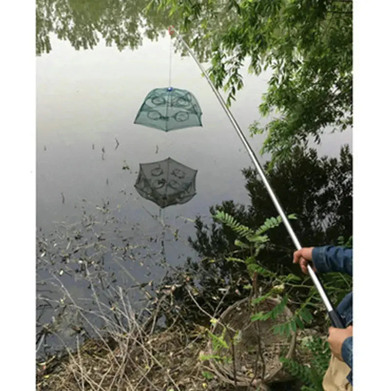 Smartlyo foldable fishing net with a lightweight frame and mesh netting, ideal for portable fishing and outdoor use