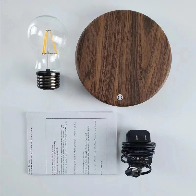 Magnetic levitation lamp by Smartlyo with a glowing spherical light floating above a sleek base, modern and innovative design.