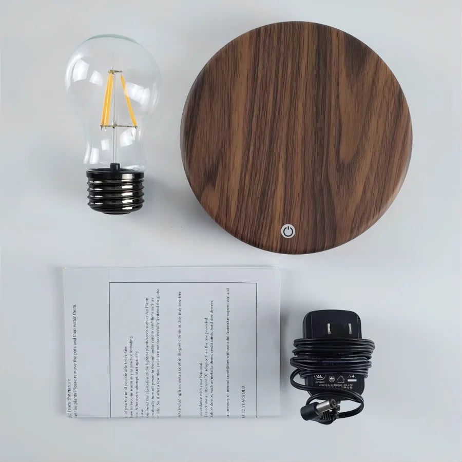 Magnetic levitation lamp by Smartlyo floating above its base with a sleek modern design and glowing light.