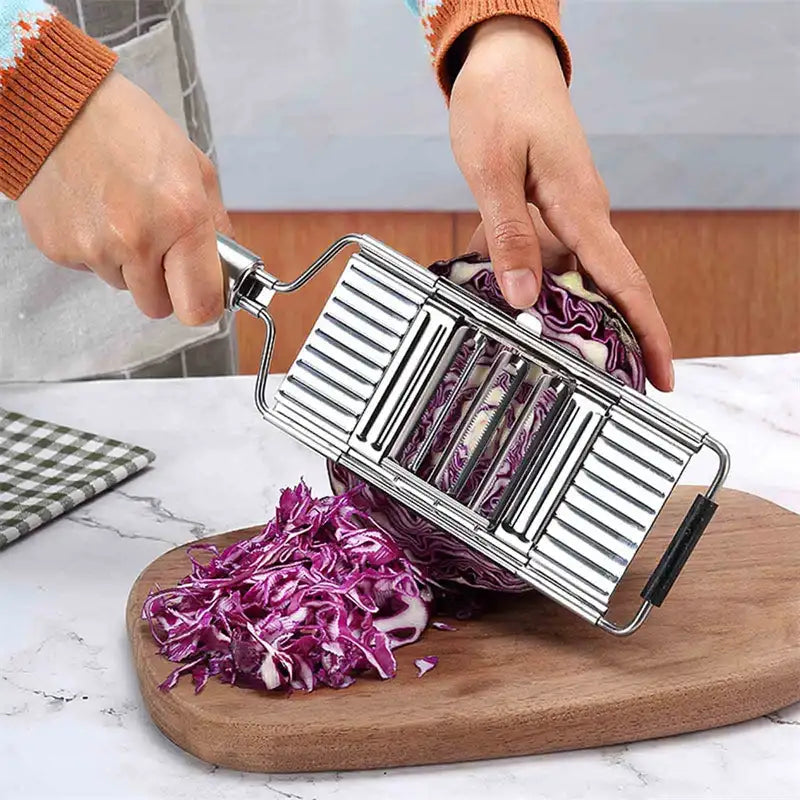 Smartlyo 4-in-1 stainless steel vegetable shredder and grater with handle, portable manual kitchen tool for slicing and shredding.