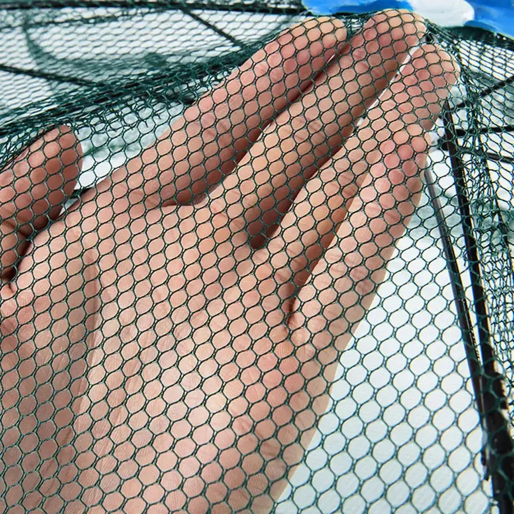 Foldable fishing net by Smartlyo with a lightweight frame and mesh netting, ideal for catch-and-release fishing.