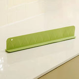 Rafford silicone sink splash guard with suction cups, made by Smartlyo, shown attached to a kitchen sink for preventing water splashes