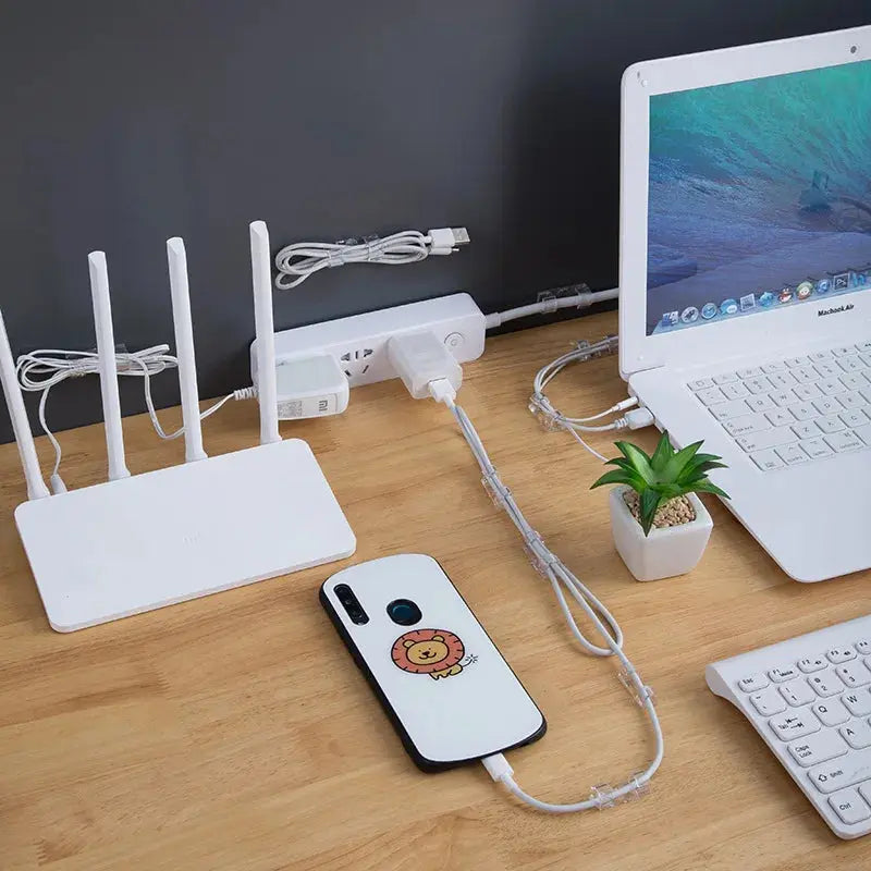 Set of 20 transparent adhesive cable clips from Smartlyo for organizing and securing cables on surfaces.