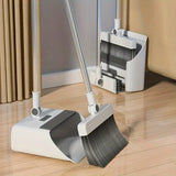 Smartlyo 3-in-1 folding broom and dustpan set for multi-surface cleaning, shown with compact design and ergonomic handle.
