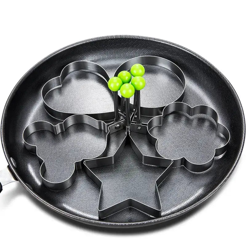 Heart-shaped stainless steel fried egg mold and pancake maker by Smartlyo, ideal for breakfast omelette rings and kitchen baking tools.