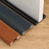 Close-up of a white door sealing strip from My Store, showing its flexible weatherproof material and installation edge.