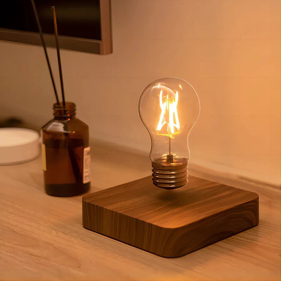 Magnetic levitation lamp by Smartlyo floating above its base with a sleek, modern design and glowing illumination.