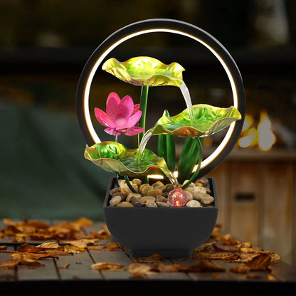 USB-powered relaxation desktop waterfall fountain by Smartlyo with flowing water and calming design on a sleek surface.