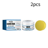 Smartlyo white shoe cleaning cream in a jar with a brush applicator for maintaining clean, polished white shoes.