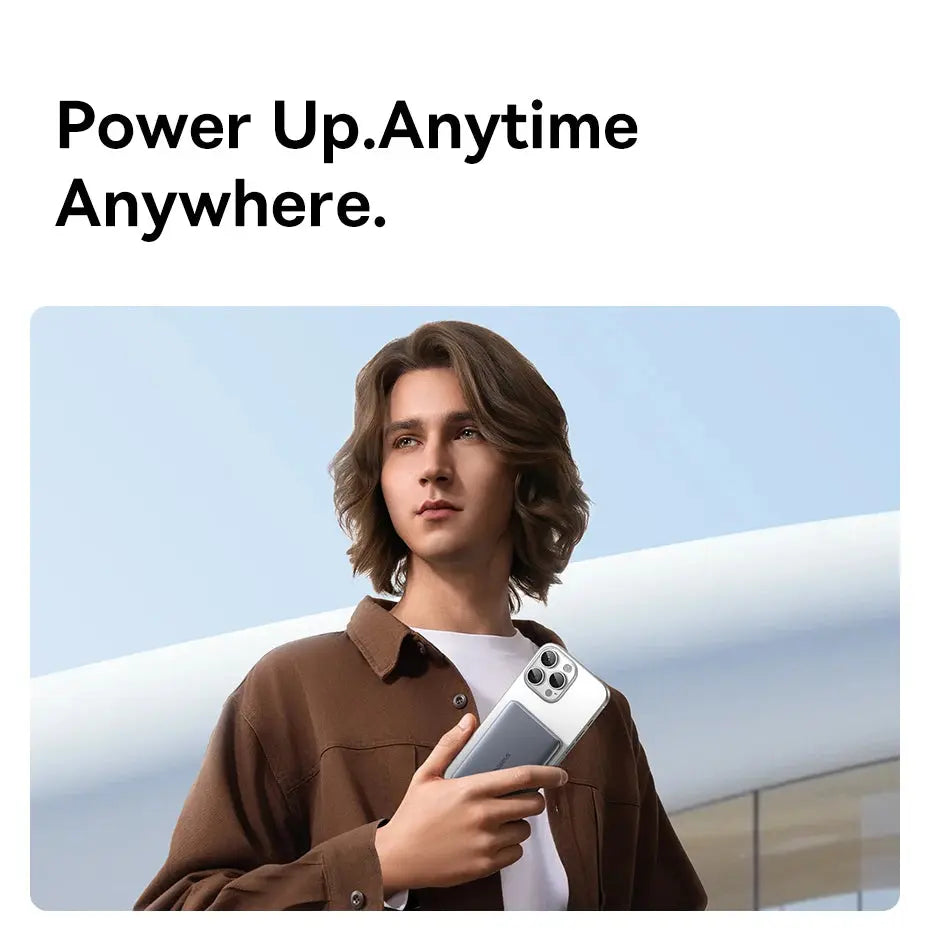 Smartlyo Baseus 5000mAh magnetic power bank connected to a smartphone for portable charging.