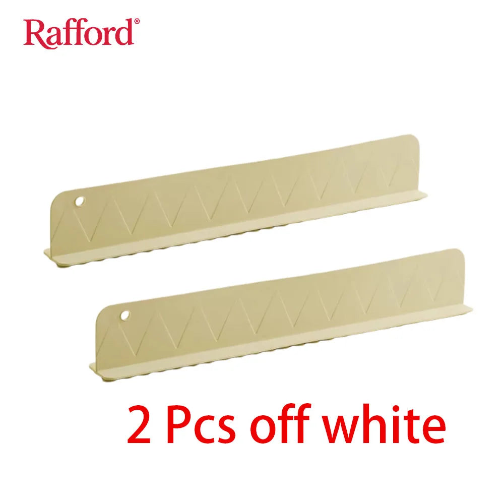 Smartlyo Rafford silicone sink splash guard with suction cups preventing water splashes at the kitchen sink.