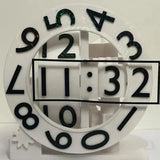 3D printed triaxial clock by Smartlyo with a rotating numeric display showcasing a modern, innovative design.